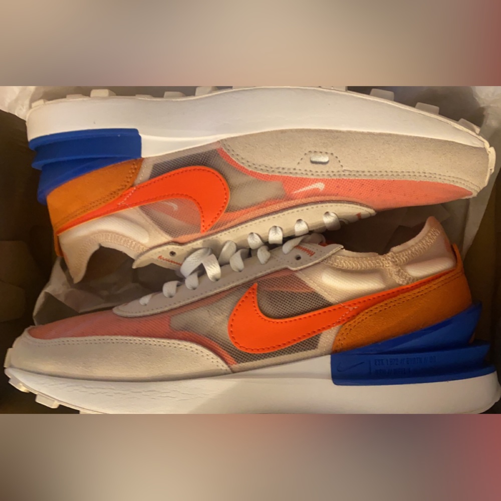 Brand new, never worn only tried on. 9.5 Nike in original packaging